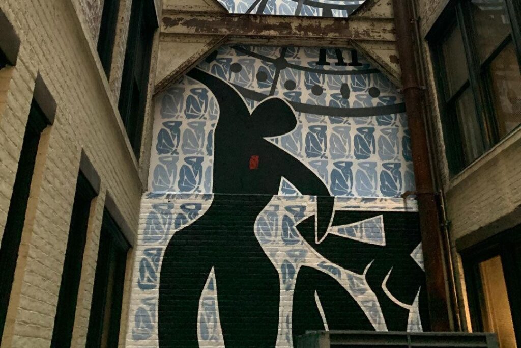 Talabolina’s mural on the Continental Building was inspired by the iconic figures of Matisse and covers a slice of the interior courtyard wall. - Photo courtesy of Svetlana Talabolina